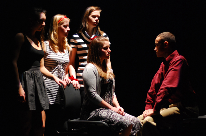 Alyssa Fox, freshman theatre studies major; Kristina Lee, freshman communication studies major; Cecilia Tolbert, sophomore theatre studies major; Stephanie Ferrebee, freshman theatre studies major; and Daniel Sutton, sophomore theatre studies major, rehearse for “Love Without a Face” Monday. The show is completely collaborative, meaning that the show had no director, and all those involved had equal input. “When someone had an idea, we went with it,” said Steve Meshenberg, the show’s playwright. “Love Without a Face” runs Tuesday at 7 p.m. and Wednesday at 12 p.m. in the Roe Green Center’s Erdmann-Zucchero Theatre. Photo by Sam Verbuecz.