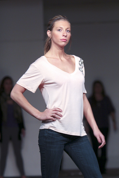 Shana Lewis, junior fashion merchandising major, rehearses for the Little Black Dress Show at Rockwell Hall on Wednesday. The Little Black Dress Show is February 23, at 7 p.m. at the Rockwell Hall Auditorium. Photo by Anthony Vence.