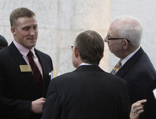 Kent State University President Lester Lefton with Undergraduate Student Government's Executive Director Justin Pierce after a luncheon at the Statehouse atrium in Columbus. Photo by Dawn Einsel.