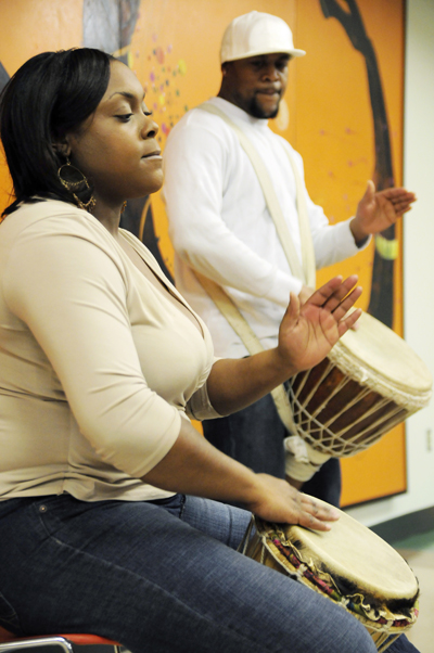 Angela Higgins and Andreyan Martin pound the drums at the African Diaspora sponsored by the Advocates of Culture and Knowledge on Saturday. Higgins and Martin, a brother and sister team, learned to play from a master drummer in New York City and have performed throughout Akron Public Schools, at the Cleveland Museum of Art, Severance Hall and many other venues. Photo By Hannah Potes