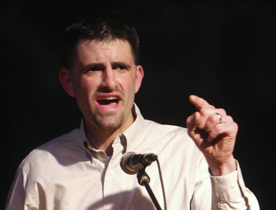 Tom Bird, a lawyer from Ravenna, speaks to the crowd gathered at the Kent Stage on Tuesday. Bird said not enough is being done to stop Senate Bill 5 and questioned why no protests were scheduled this week in Columbus. Photo by Valerie Brown