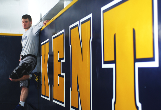 Senior wrestler Dustin Kilgore is the first Kent State wrestler to reach 100 career victories during his junior season. He is now in 3rd place among Kent State’s career winners. Photo by Sam Verbulecz