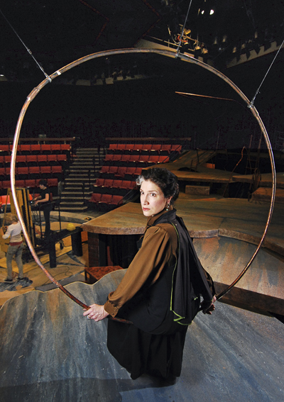 MFA acting candidate Melissa Owens shows off the costume for Horatio that she will wear in the School of Theatre and Dance's production of Hamlet. Photo by Matt Hafley.