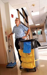 KRISTEN SALEM I SUMMER KENT STATER Ted Click, a custodian at Kent State University, cleans the Liquid Crystal Building on the morning of July 5th. Ted has been a custodian for 3 years, working from 4 a.m. to noon.