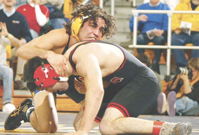 Stevie Mitcheff, in the 133 weight class, defeated his opponent Izzy Montemayor 6-4 during a Feb. 21 wrestling match. The Flashes defeated Northern Illinois 37-6. File photo by Jessica Yanesh.