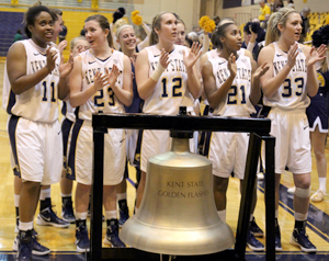 The Flashes celebrate their victory against Central Michigan on Jan. 22. The Flashes beat the Chippewas 67-64. Photo by Adrianne Bastas.