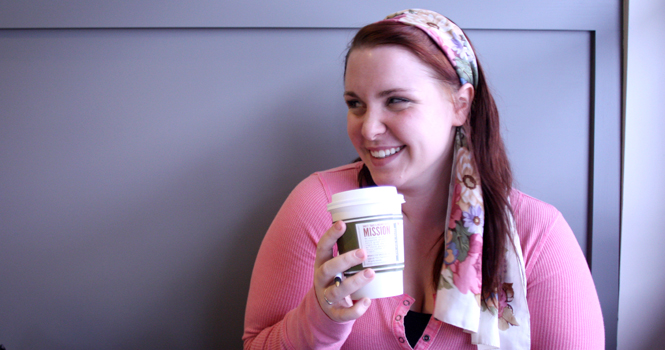 Caitlin Rose, junior musical theatre major, enjoys coffee at Tree City Coffee on Jan. 19. Rose hopes to work at the coffee shop, which opened Monday. Photo by Casey Lawver.