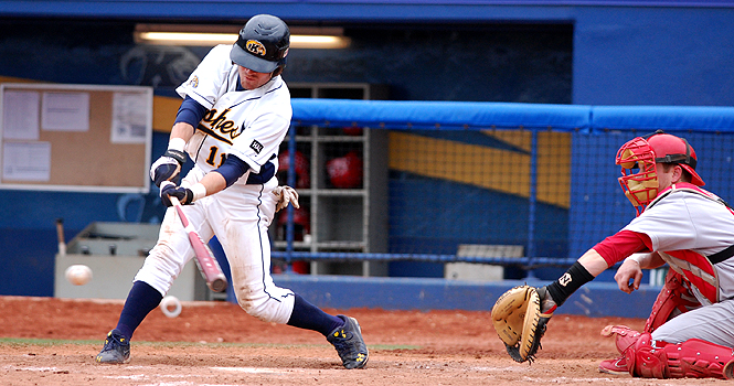 Joe Koch, senior outfielder, hits the ball at the game against Youngstown State on April 12. Photo by Jackie Friedman.