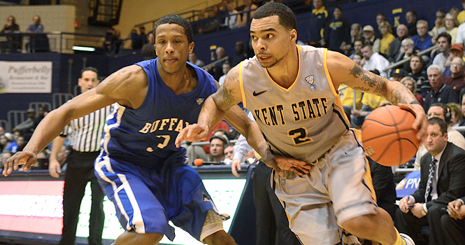 Kent State guard Michael Porrini attempts to dribble closer to the net in a game against Buffalo University at the MAC Center on Tuesday, Feb. 14. The Flashes beat the Bulls 76-71 in a key East Division game. Photo by Monica Maschak.