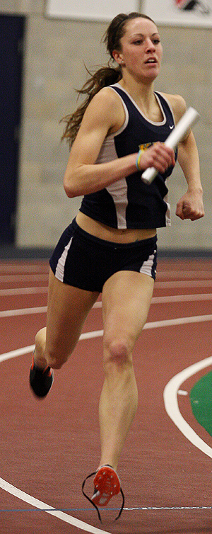 Sophomore distance runner Paige Foster runs in the Women's 4x400 meter relay on Saturday, Jan. 15, 2011. The Flashes placed first in the Women's 400 meter dash and second in the Men's 800 meter dash. Photo by Valerie Brown.