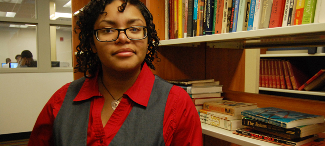 Paisley Stovall, senior Music, Anthropology, and Pan-African studies major, sits in Oscar Ritchie Hall on Feb. 6. "The reason I picked three is because I couldn't decide and they all go together," Stovall said. Photo by Nancy Urchak.