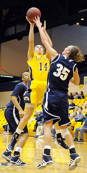 Junior guard Tamzin Barroilhet goes up for two again Akron on Feb. 25. The Flashes beat the Zips 77-76. Photo by Phillip Botta.