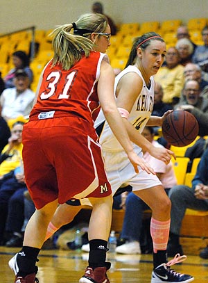 Junior guard Tamzin Barroilhet drove the ball down the court during the Flashes' game against the Miami Redhawks on Wednesday, Feb. 15. Miami won in over time, with a final score of 65-69. Photo by Jenna Watson.