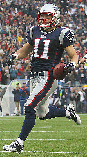 Miami Dolphins quarterback punter Brandon Fields chases New England Patriots Julian Edelman, who returned a punt 94 yards for a second-quarter touchdown. The Patriots defeated the Dolphins, 38-7, at Gillette Stadium in Foxborough, Massachusetts, Sunday, January 2, 2011. (MCT)