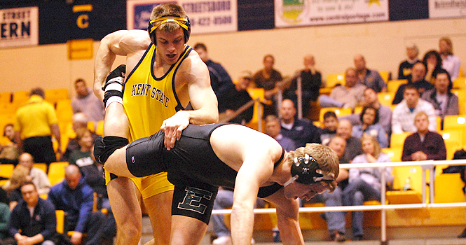 Brandonn Johnson, junior, wrestles Phillip Joseph, sophomore, at the match against Eastern Michigan on Feb. 5. The Flashes won 28-10. Photo by Nancy Urchak.