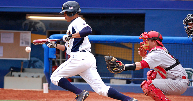 Sophomore infielder Derek Toadvine bunts the ball during a game against Youngstown State Tuesday, April 12. Toadvine is a three-time first team all conference pick. Photo by Jackie Friedman.