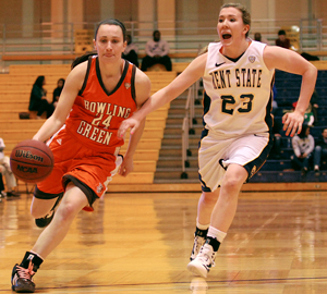 Kent State freshman guard Jamie Hutcheson blocks her opponent while she runs down the court in a game against Bowling Green at the M.A.C. Center Tuesday, February 28. The Flashes lost to the Falcons 91-48. Photo by Monica Maschak.