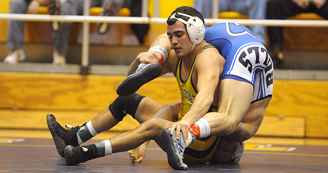 Senior 133 weight class Stevie Mitcheff wrestles against Buffalo on Feb. 3. Kent won 25-9. Photo by Phil Botta.