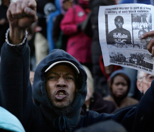 "No Justice No Peace" is chanted at the first of three candlelight vigils this week for Trayvon Martin at Love Park in Philadelphia, Pa. on March 26. Photo courtesy of Elizabeth Robertson/Philadelphia Inquirer/MCT.