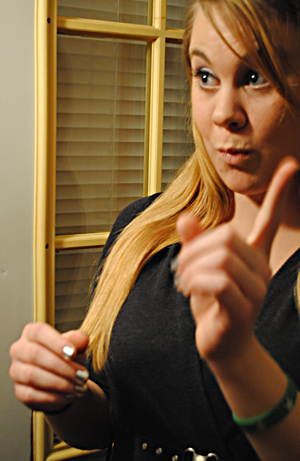 Bethany Stahler, senior American Sign Language major, student teaches at Cleveland Heights High School. She teaches three levels of ASL classes throughout the day. Photo by Leighann McGivern.