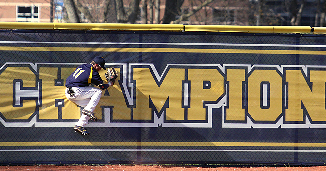 Senior Outfielder Joe Koch catches the last hit off of Niagara at Mural Field on April 24. The Flashes won against the Purple Eagles 8-4. Photo by Brian Smith.