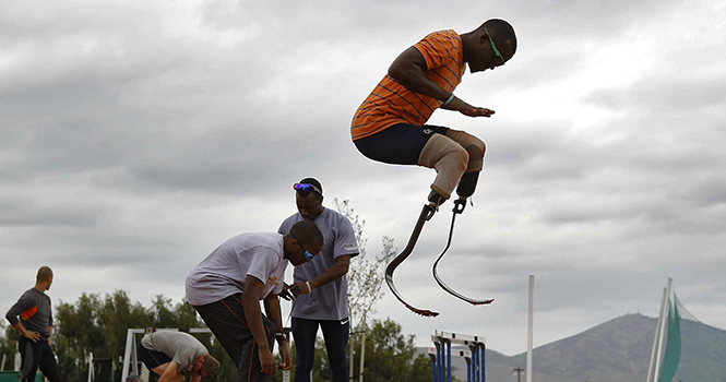 Blake Leeper warms up during a workout with other Paralympic athletes at the USA Olympic training facility in Chula Vista, California on April 13, 2012. Leeper ranks among the top sprinters headed for the 2012 Paralympic Games, which will be held after the London Olympics this summer. Photo by Robert Gauthier/Los Angeles Times/MCT.