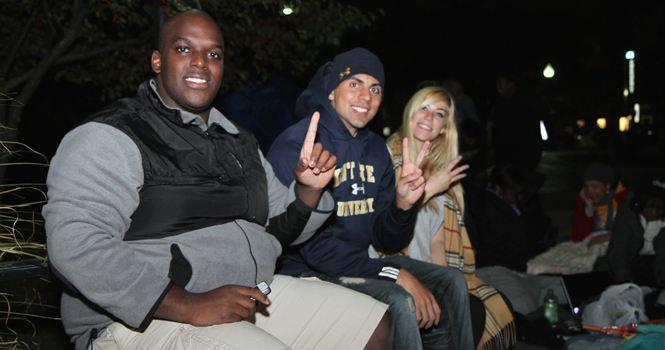 Kent State students Kevin Ball, Brandon Arroyo and Brittany Blose camp outside the M.A.C. Center Tuesday night to see President Obama speak on campus September 26. Ball, Arroyo and Blose were the first three in line to see the president. "I want to hear him get Kent State fired up to vote," Arroyo said. Photo by Shane Flanigan.