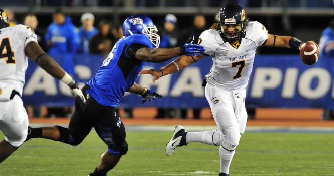 Kent State quarterback #7 David Fisher tries to avoid being sacked by Buffalo defender #46 Khalil Mack. Photo by David Dermer.