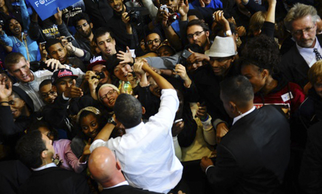 U.S. President Barack Obama interacts with students and member so the community after his campaign speech in the M.A.C. Center Wednesday. Obama's speech covered topics like keeping jobs in American and taking care of veterans. Photo by Laura Fong.