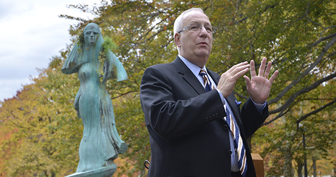 Kent State University President Lestor Lefton outside at the sculpture induction ceremony for Robert Wick's work titled "Sidney", on Oct. 19. Photo by JACOB BYK.