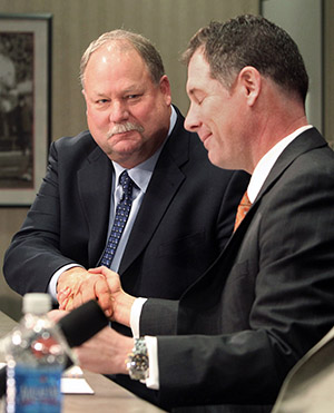 Cleveland Browns President Mike Holmgren, left, at a news conference to introduce new head coach Pat Shurmur, right, to the media at the Browns' training facility in Berea, Ohio on Friday, January 14, 2011. (Phil Masturzo/Akron Beacon Journal/MCT)