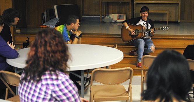 Freshman Maddie Finn performs during Pride! Kent's family spaghetti dinner fundraiser at the United Church of Christ on Friday, October 19, 2012. The dinner was geared toward friends and family members who are allies of the LGBT community in celebration of Pride's Ally Week. Photo by JENNA WATSON.