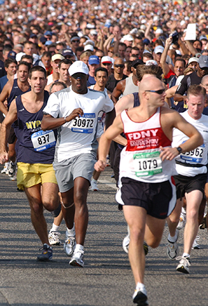 Sean P. Diddy Combs, center, wearing white hat, takes on the challenge of the "2003 ING New York City Marathon" as he starts running on the Verrazano bridge along with tens of thousands of other participants, in New York, on Sunday, November 2, 2003. (nk) 2003. Photo by Nicolar Khayat/ABACA Press