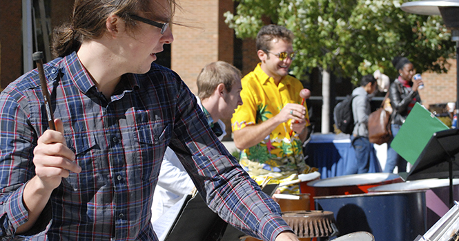 Flash in the Pan, a group of steel drum musicians, performed at the Festival of the Arts in Risman Plaza October 11. Photo by GRACE JELINEK.