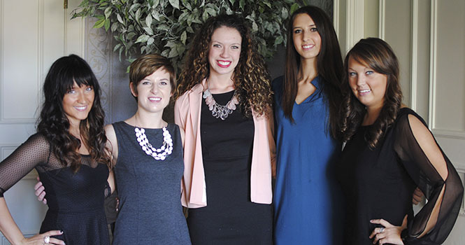 The Kent State Fashion Student Organization stands backstage at Brookside Country Club in Canton after their Soroptimist Fashion Show on Saturday, October 13. Photo by Jenna Watson