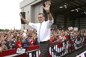 Republican presidential candidate Mitt Romney responds to cheering supporters at an airport rally in Kissimmee, Florida, Saturday, October 27, 2012. (Joe Burbank/Orlando Sentinel/MCT)