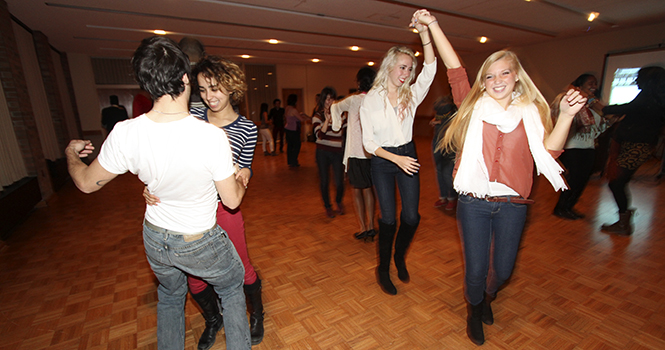 Participants of the Bailando en la Noche salsa dance inside the Student Center on Oct. 10. The Latin dance class was sponsored by Advocates of Culture and Knowledge, and The Fiat Club. Photo by Brian Smith.