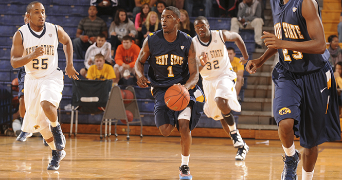 Kris Brewer, sophomore guard of the Golden Flashes, runs the ball down the court during a practice team game for MAC Madness last Friday, October 12, 2012. Photo by PHILIP BOTTA.