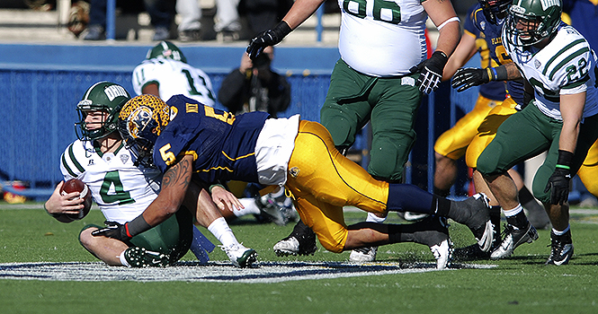 Junior Defensive lineman Roosevelt Nix sacks Ohio's quarterback Tyler Tettleton during Kent's 28-6 win over the Bobcats on Nov. 23, 2012. The Flashes will face Northern Illinois for the Mid American Conference championship game in Detroit on Friday, Nov. 30 at 7 p.m. Photo by MATT HAFLEY.