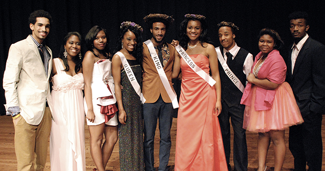 All contestants stand with queen Ajee Smith, king Kevin White, princess Dorothy Bell and prince Andre Taylor at the 44th annual Renaissance Ball November 14. Photo by Grace Jelinek.