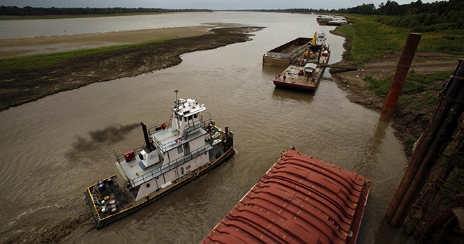 Drought has caused low flows in the Mississippi River, slowing vital barge traffic to a crawl. Photo courtesy of MCT Campus.