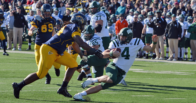 Junior defensive lineman Richard Gray runs dun Ohio's Tyler Tettleton for a sack and loss of 9 yards during Kent's 28-6 win over the Bobcats at Dix Stadium on Friday, Nov. 23. Photo by Matt Hafley.