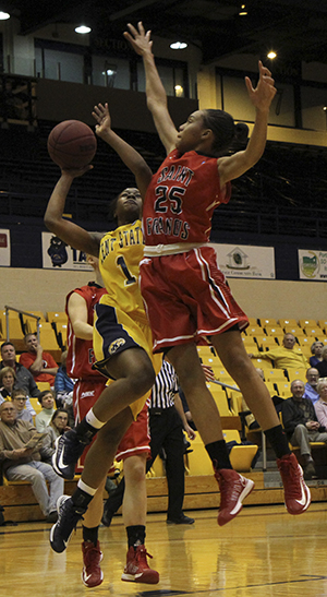 Junior guard Ashley Evans goes up for a shot against her St. Francis (Pa.) opponent during an 81-67 home loss Wednesday, Nov. 28. The Kent State women's basketball team fell to 0-6.. Photo by Shane Flanigan.