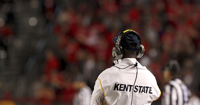 Kent State Head Coach Darrell Hazell overlooks the Rutgers scarlet crowd at High Point Solutions stadium on Oct. 27, 2012. Hazell, a New Jersey native, was coach at Rutgers for three years from 2001 to 2003. The Flashes defeated the Scarlet Knights at their homecoming game, 35-23. Photo by Brian Smith.