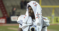 Senior runningback Dri Archer walks off the field after Kent's 17-13 loss to Arkansas State on Jan. 6, 2013.. Photo by Matt Hafley.