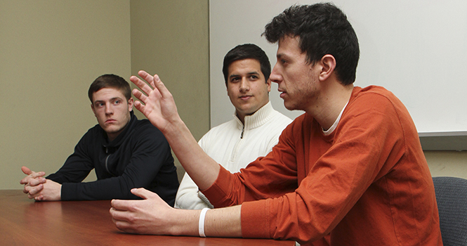 Kent State computer science majors David Steinberg (right), Daniel Gur (middle) and Camden Fullmer (left) are the developers of "FaceWash," a Facebook app which allows users to search through their activity and content and remove potentially unwanted materials from public view. Photo by SHANE FLANIGAN.