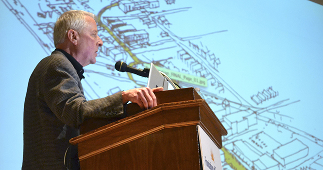 One of four finalists presents his designs for the Architecture First Look competition in the University Auditorium in Cartwright Hall on Thursday, Jan. 17. The finalist were competing to design the new building for Kent State's College of Architecture and Environmental Design. Photo by Chloe Hackathorn.