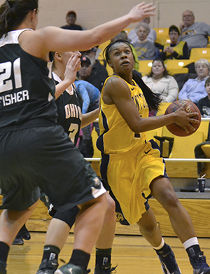 Junior guard Ashley Evans looks to shoot the ball at Kent State's game on Feb. 20, 2013. The Flashes lost 61-55. Photo by Chloe Hackathorn.