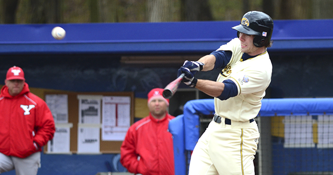 Nick Hamilton, junior infielder, hits the ball during the home game against Youngstown State University on April 11, 2012. The Flashes beat the Penguins 14-4. Photo by NANCY URCHAK