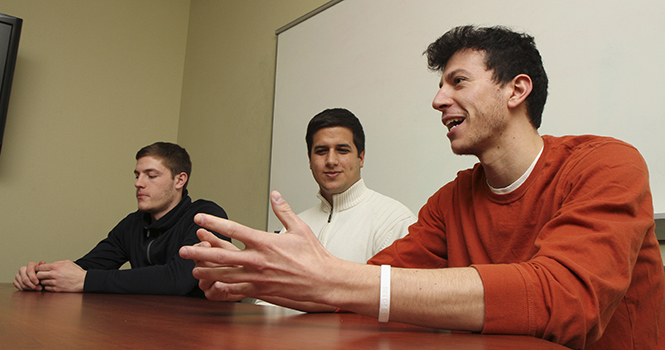 Kent State computer science majors David Steinberg (right), Daniel Gur (middle) and Camden Fullmer (left) are the developers of "Facewash," a Facebook app which allows users to search through their activity and content and remove potentially unwanted materials from public view. Photo by Shane Flanigan.